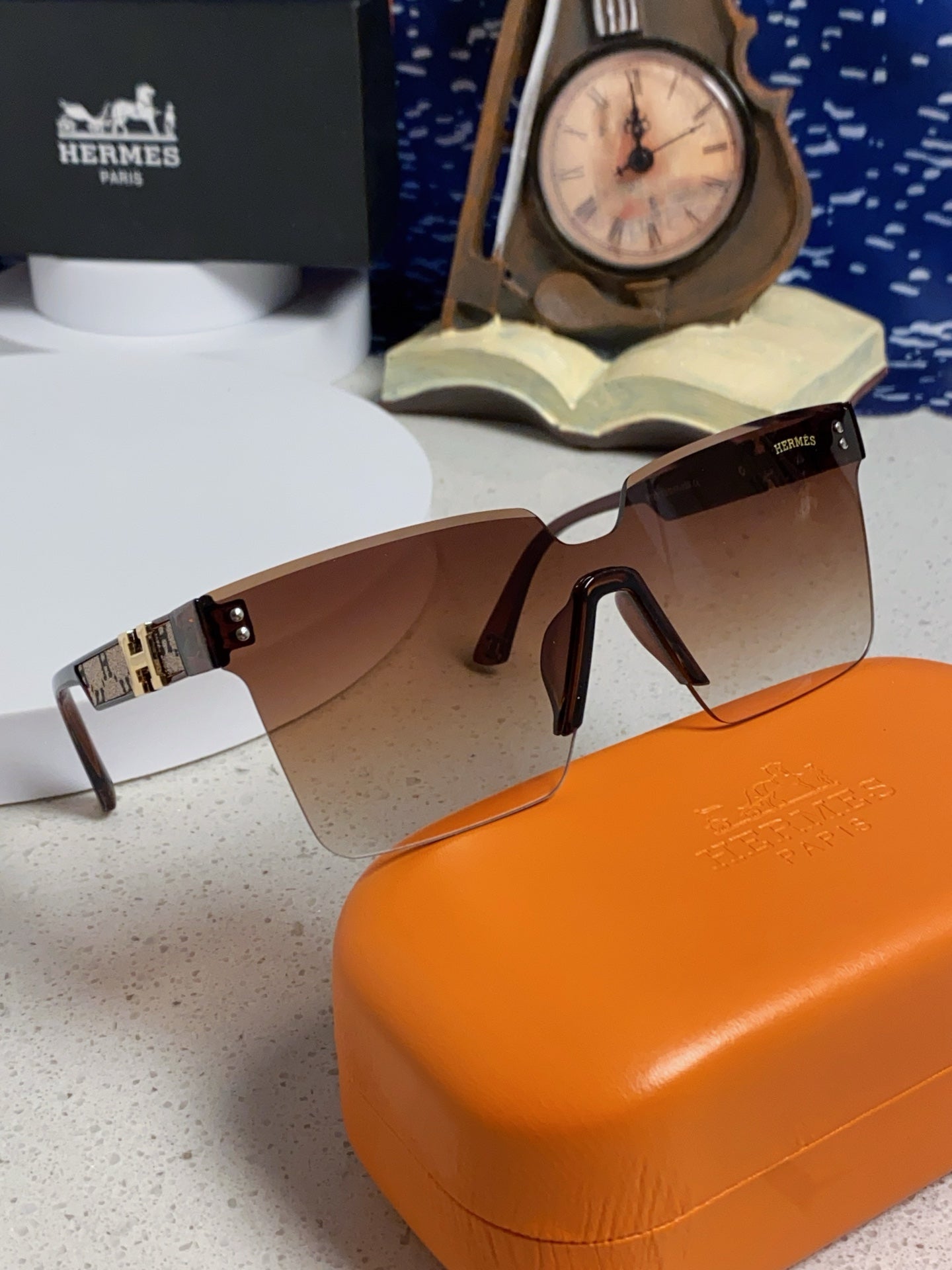 Hermès Lightweight Rimless Red Lens Sunglasses for Women - detail image 10