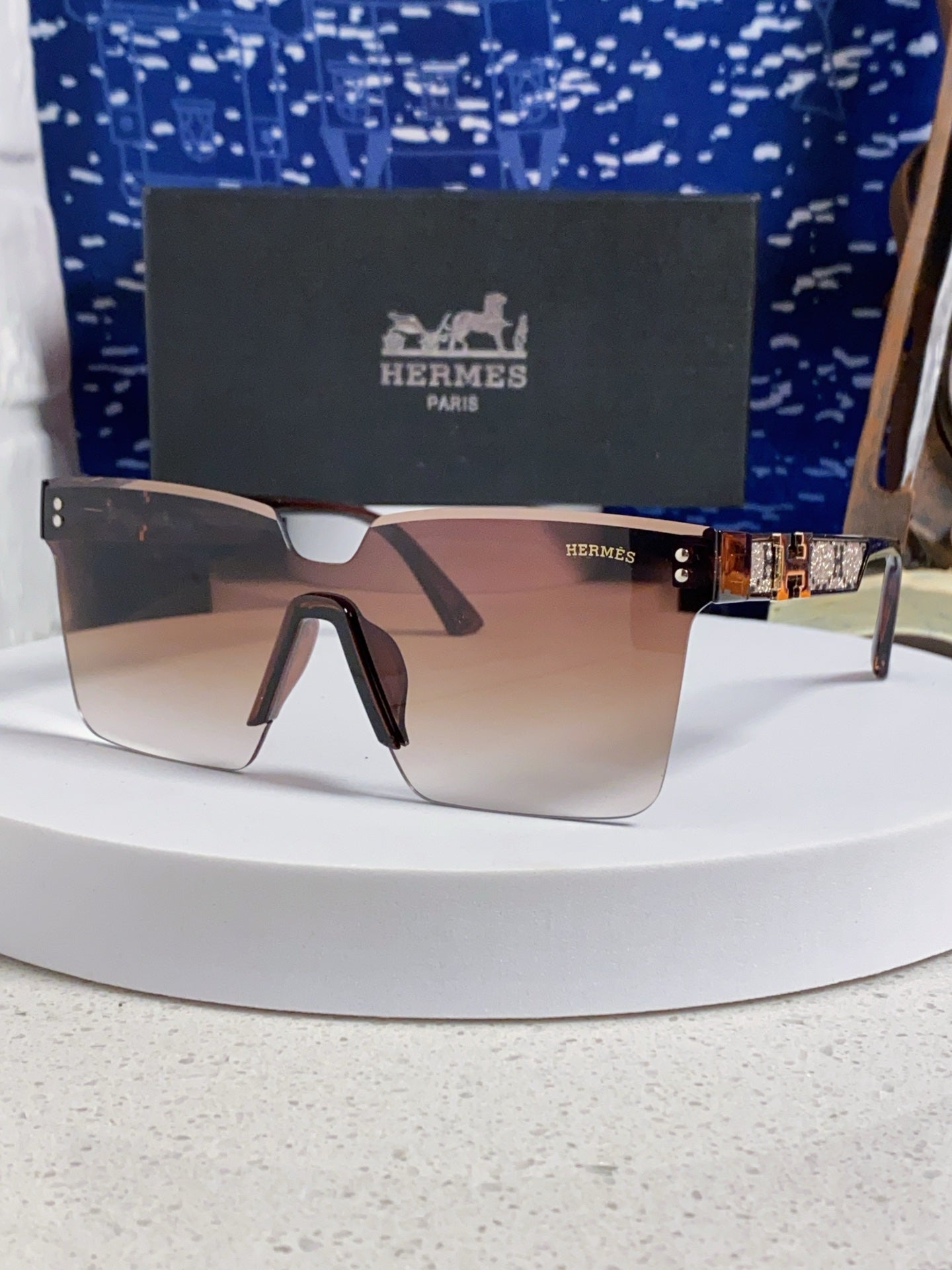 Hermès Lightweight Rimless Red Lens Sunglasses for Women