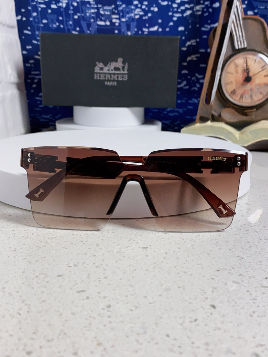 Hermès Lightweight Rimless Red Lens Sunglasses for Women - detail image 9