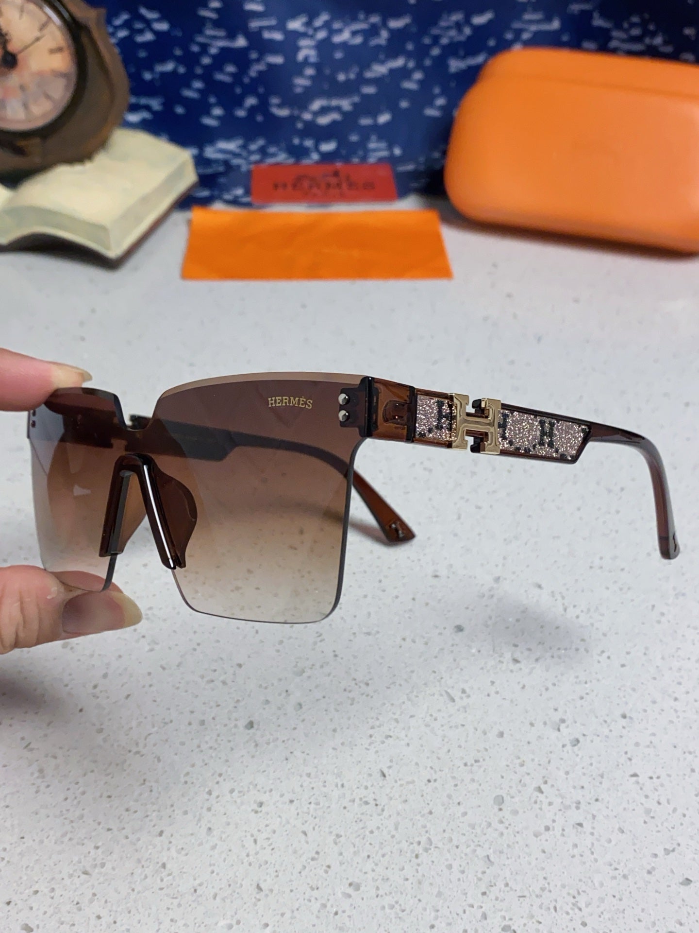 Hermès Lightweight Rimless Red Lens Sunglasses for Women - detail image 6