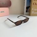 Miu Miu Cat-Eye Silver Lens Sunglasses for Men & Women - 432619