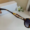 Prada Cat-Eye Silver Lens Sunglasses for Men & Women - 358422