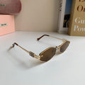 Miu Miu Metal Round Brown Lens Sunglasses for Men & Women - 432701