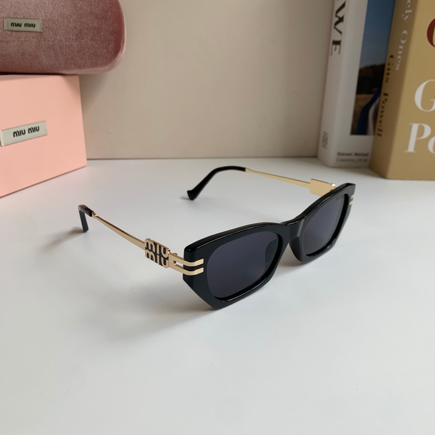 Miu Miu Cat-Eye Silver Lens Sunglasses for Men & Women