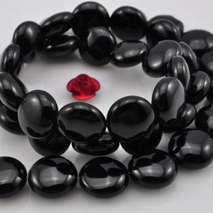 39 pcs of Black Onyx smooth coin beads in 10mm