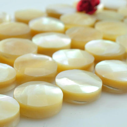 37 pcs of MOP faceted  flat coin beads in 10mm